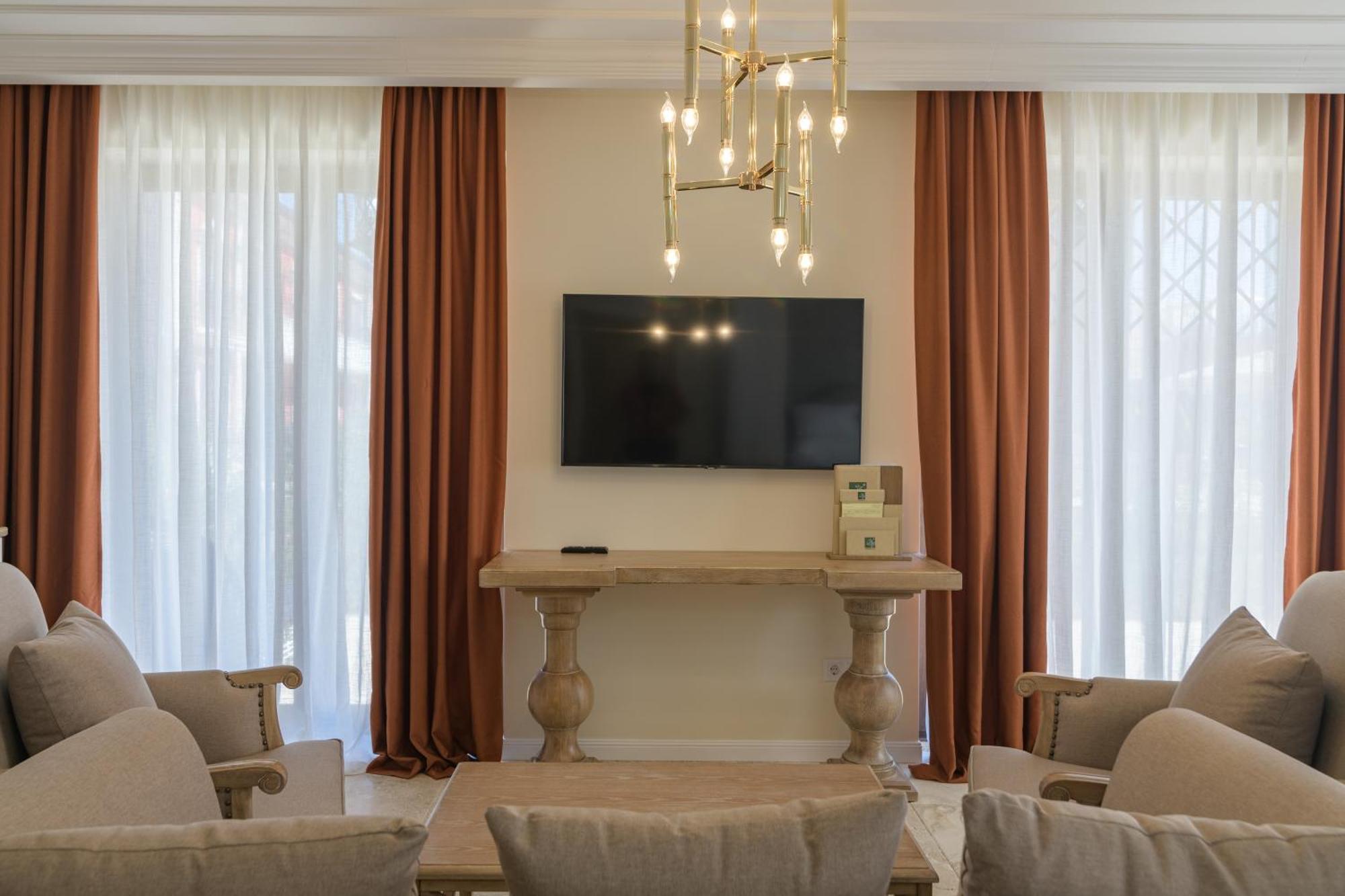 Eco Therma Village Kranevo Exterior photo A living room with a television